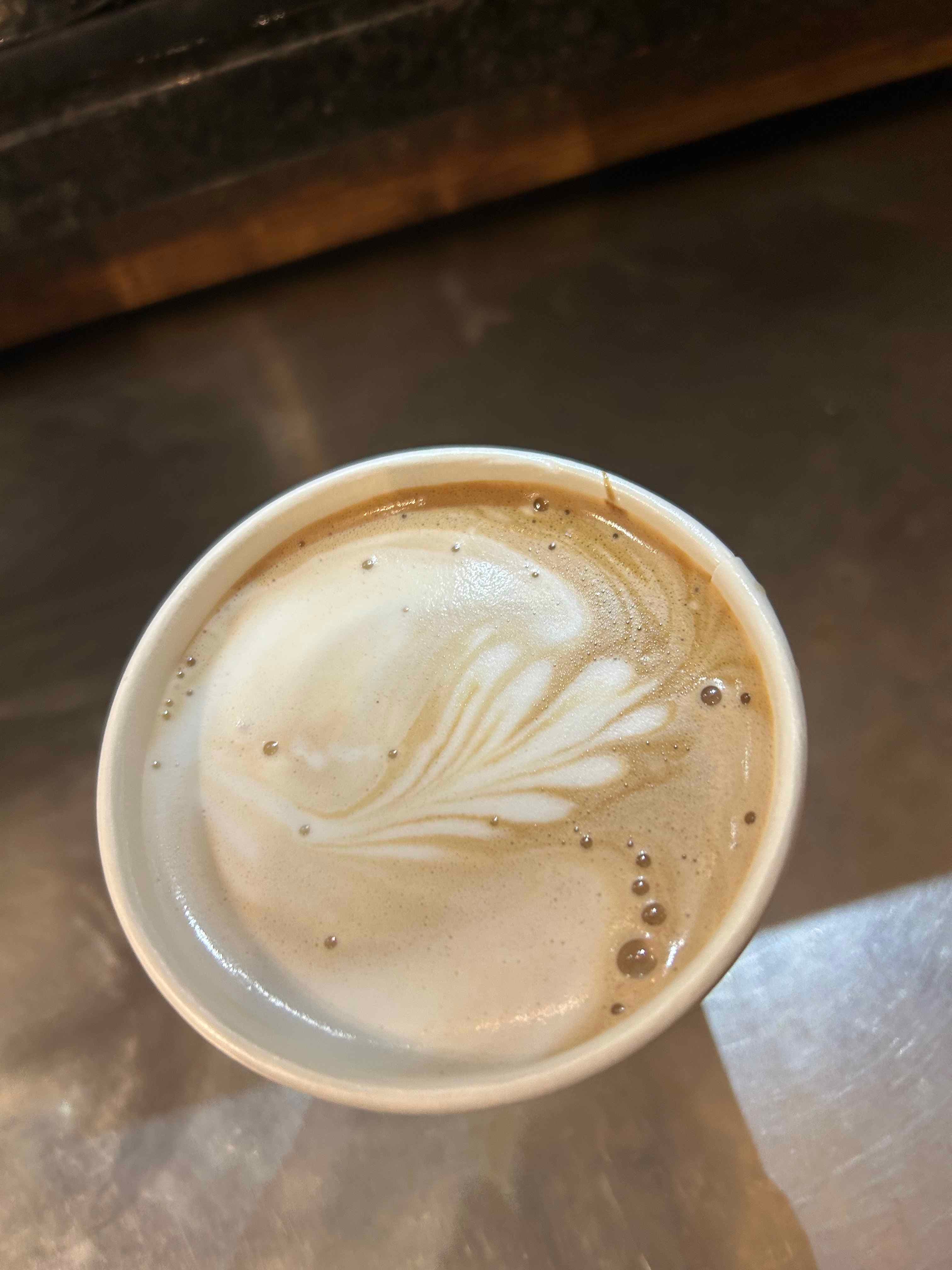 Latte with a delicate feathered pour on top